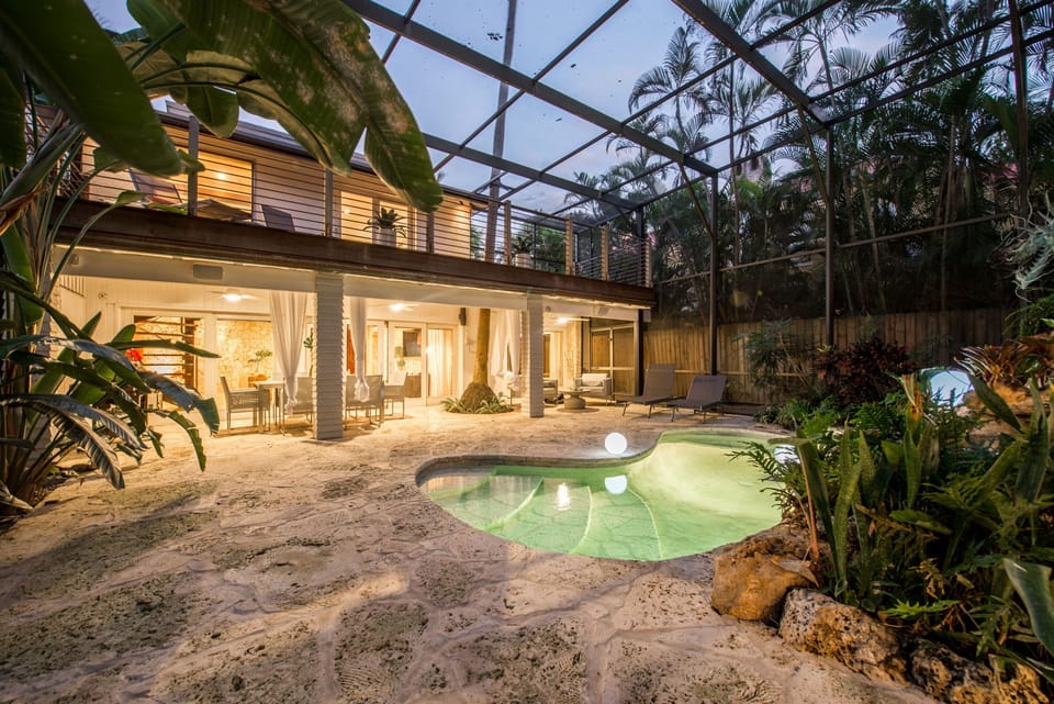 Outdoor Areas - View of main house from Bungalow.  Upstairs level is Master bedroom with private terrace.