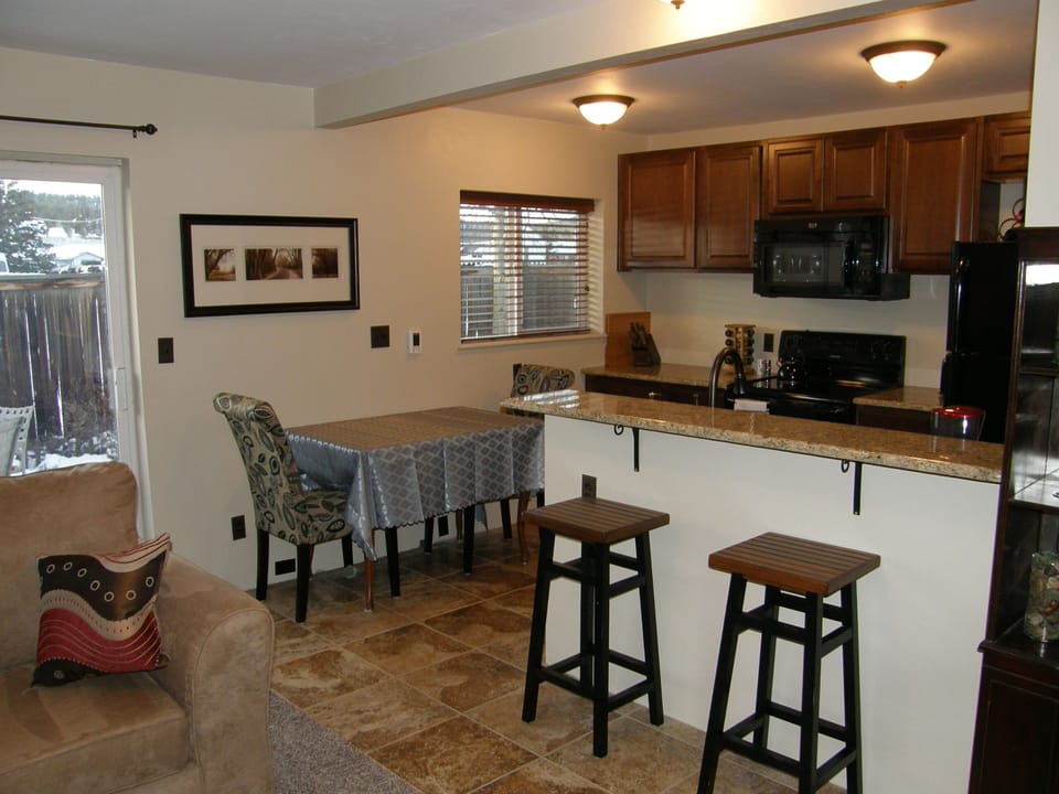 Kitchen has heated floor! Granite counters, new cabinetry, new appliances (range, micro, dishwasher), new sink....Heck, new everything! 