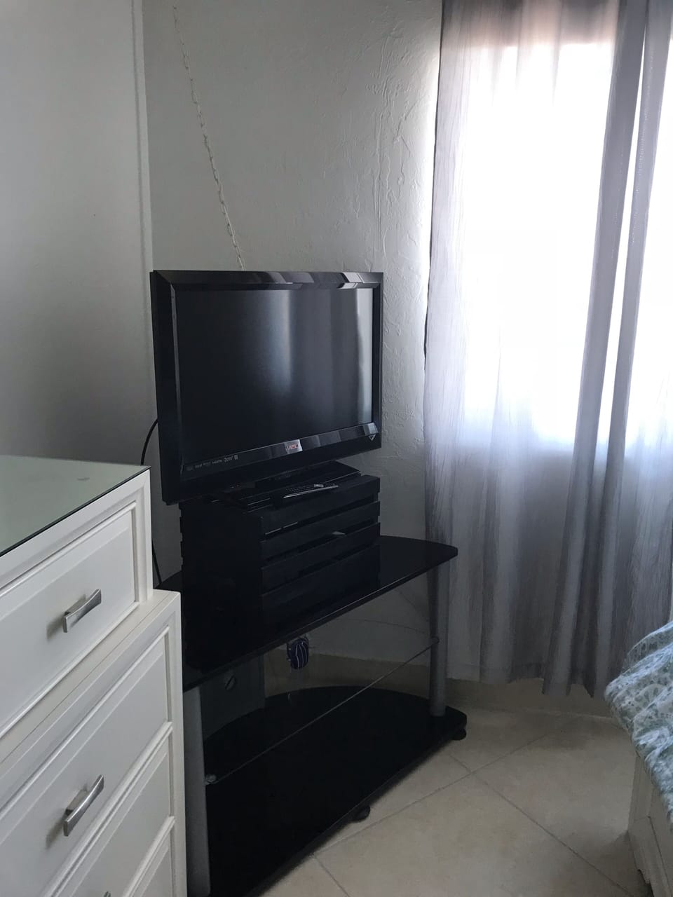 Large flat screen T.V. In master bedroom