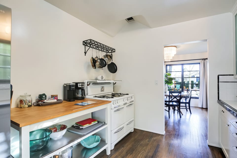 With it's charming old school (well working) stove, the charm exudes in this historic property