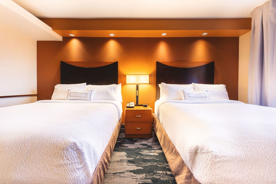 Room, 2 Queen Beds | In-room safe, desk, iron/ironing board, WiFi (free)