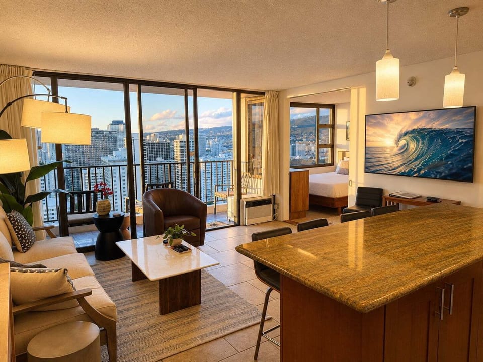 Large Smart TV in the living room, with an additional flat-screen TV in the bedroom.