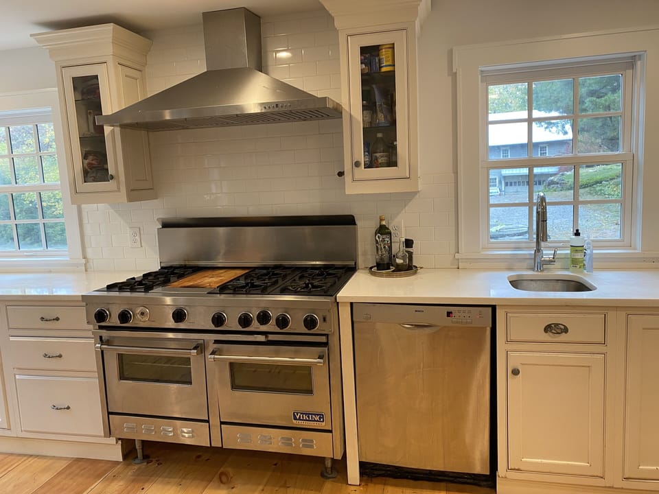 2 Viking stoves with 6 burners and 2 Bosch dish washers in the kitchen