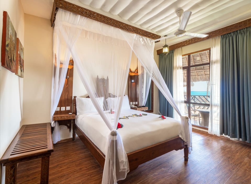 Room, 1 Queen Bed, Balcony (View) | Minibar, desk, laptop workspace, iron/ironing board