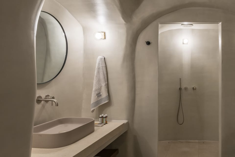 Shower, rainfall showerhead, designer toiletries, hair dryer