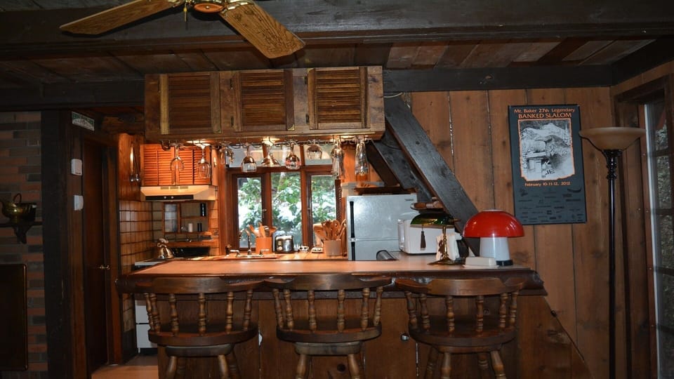 Kitchen Bar with a variety of hanging glasses for fun. 
