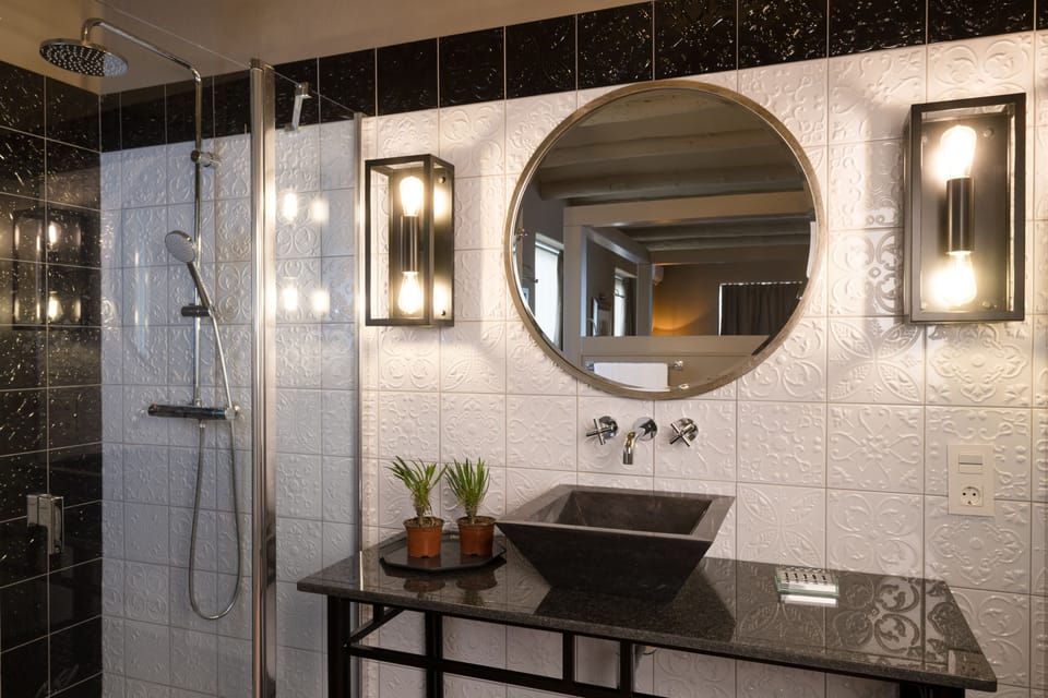 Suite 4 | Bathroom | Shower, designer toiletries, hair dryer, towels