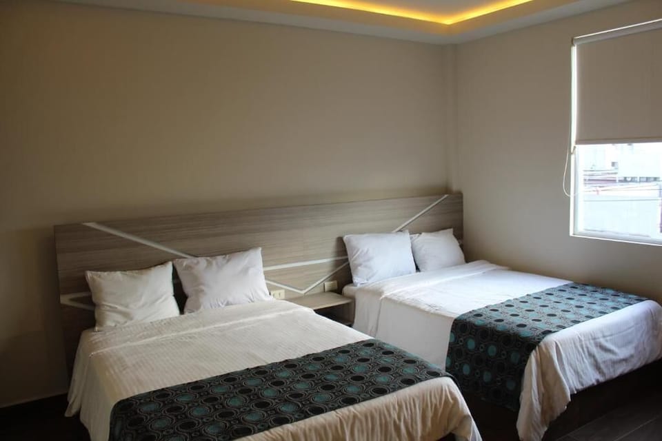 Laptop workspace, WiFi (free), bed sheets