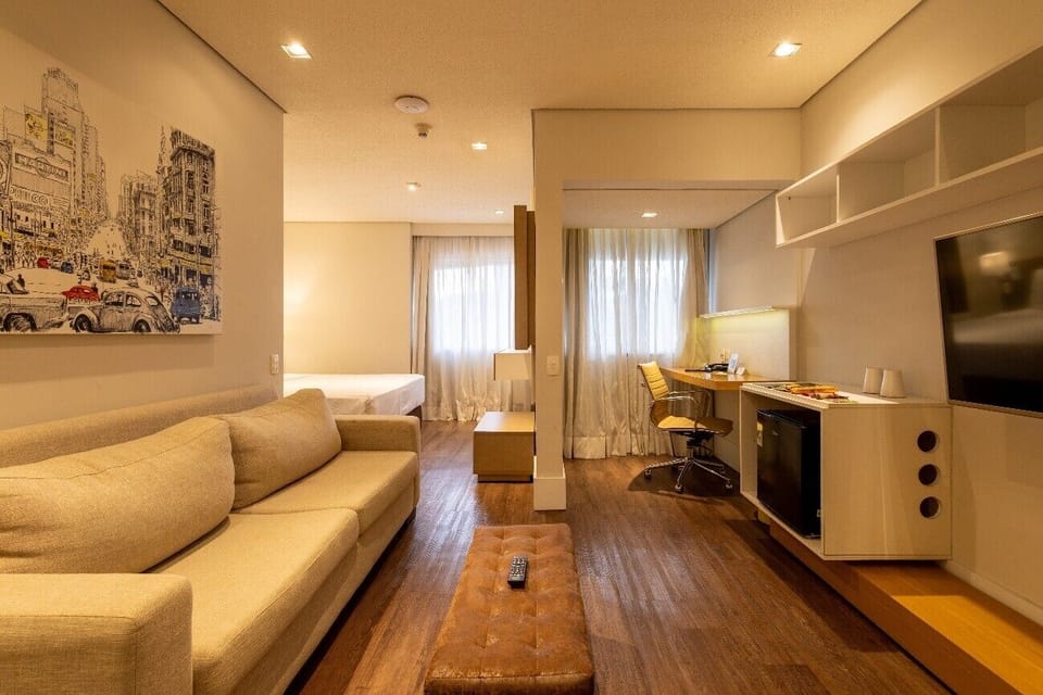 Deluxe Room, 1 Double Bed | Living area | 32-inch LCD TV with cable channels, TV
