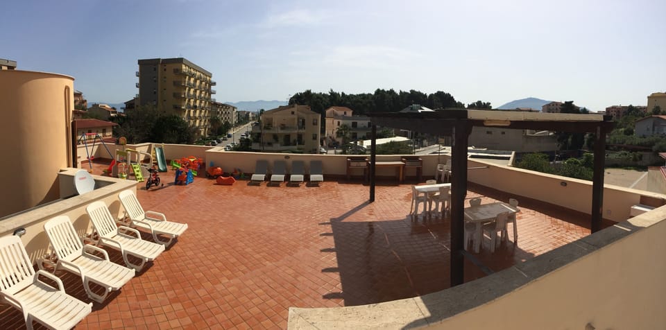 Terrace, gazebo, barbecue, deck chairs and so on