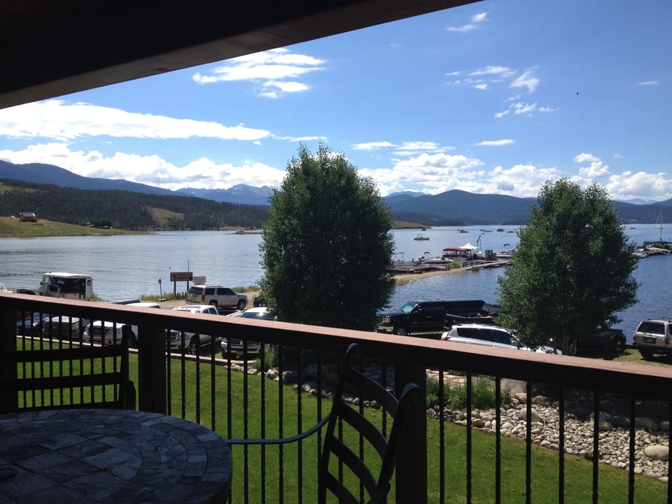 One of 2 decks (plus patio with private hot tub) with Lake Granby - 50 feet away