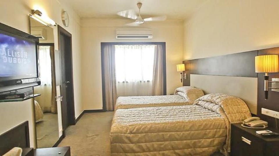 Premium bedding, in-room safe, individually decorated