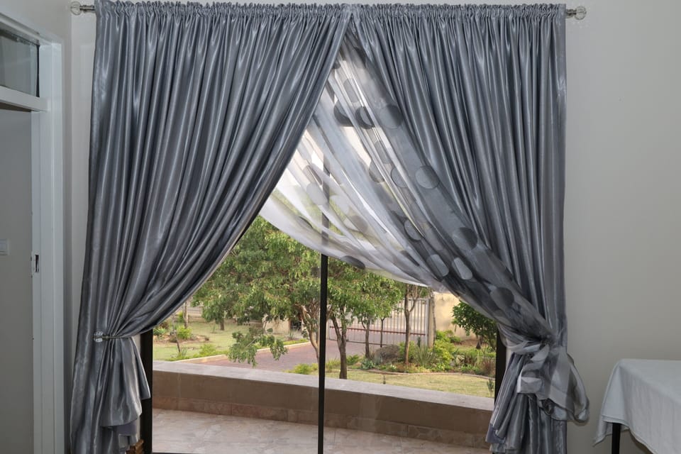 Family Apartment, 2 Queen Beds, Pool View | Garden view