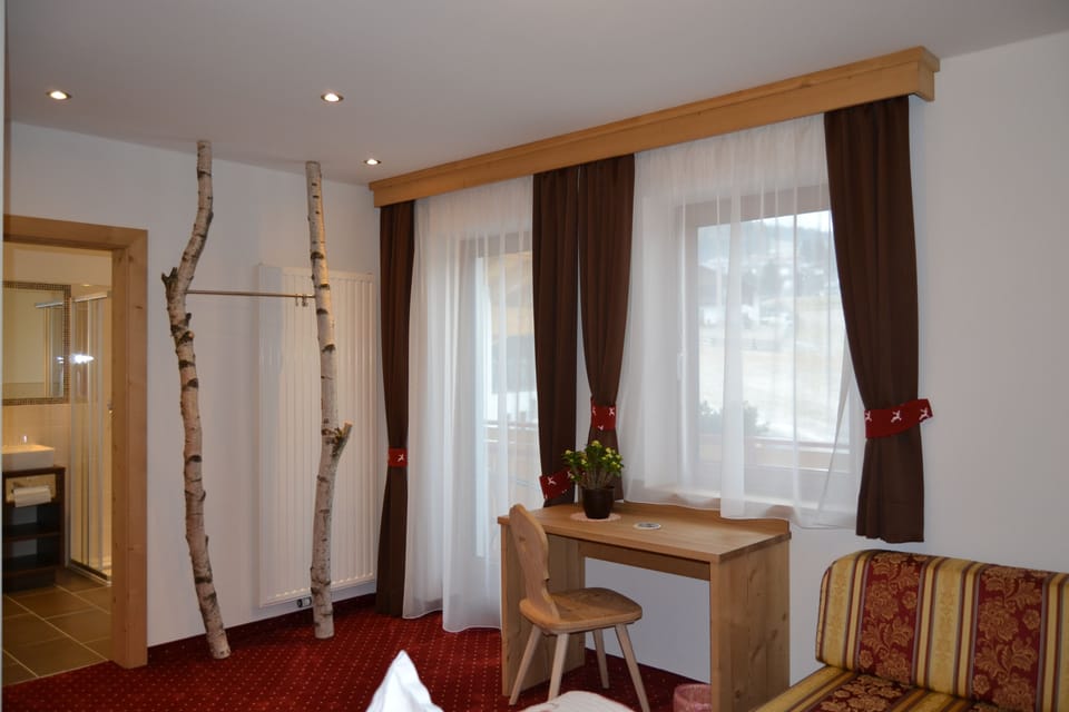 Junior Suite, Balcony | Hypo-allergenic bedding, in-room safe, desk, laptop workspace