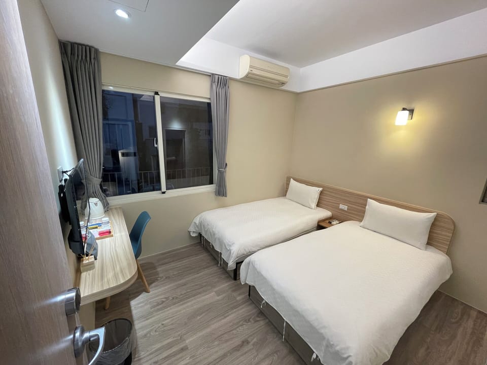 Twin Room | Desk, blackout drapes, free WiFi, bed sheets