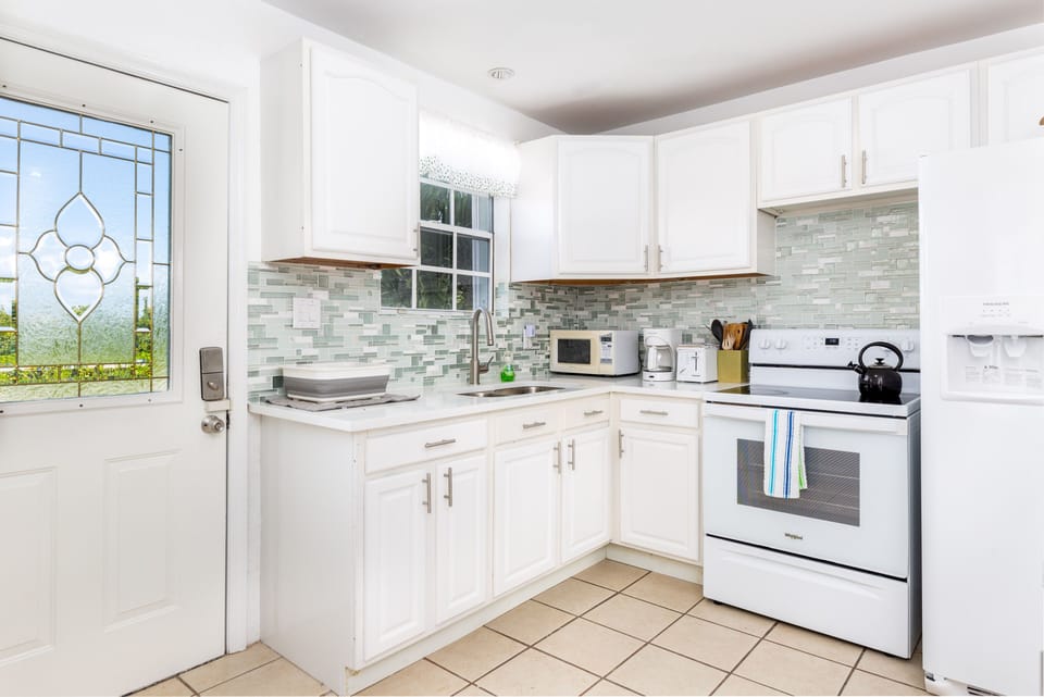 Modern style kitchen with fully equip utensils. 