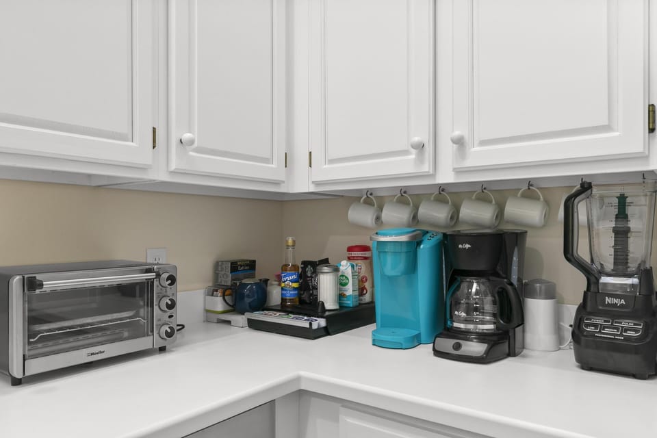Keurig and classic Mr. Coffee drip pot. Coffee pods, tea and sweeteners provided