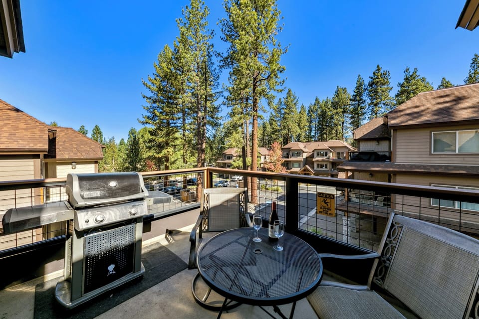 Your private balcony offers peaceful forest views and a BBQ grill for memorable outdoor dining experiences.