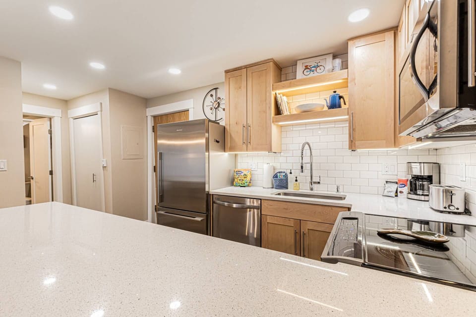 Whip up family meals with ease in this spacious kitchen featuring full-size appliances and plenty of prep space.
