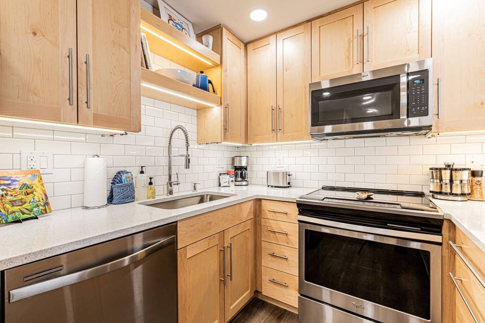 Feels just like home—this kitchen comes stocked with all the essentials and stainless steel appliances.