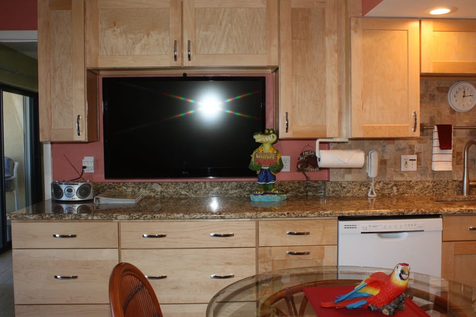 55" flat screen TV with cable, 3 TV's total in the condo with 1 in each bedroom
