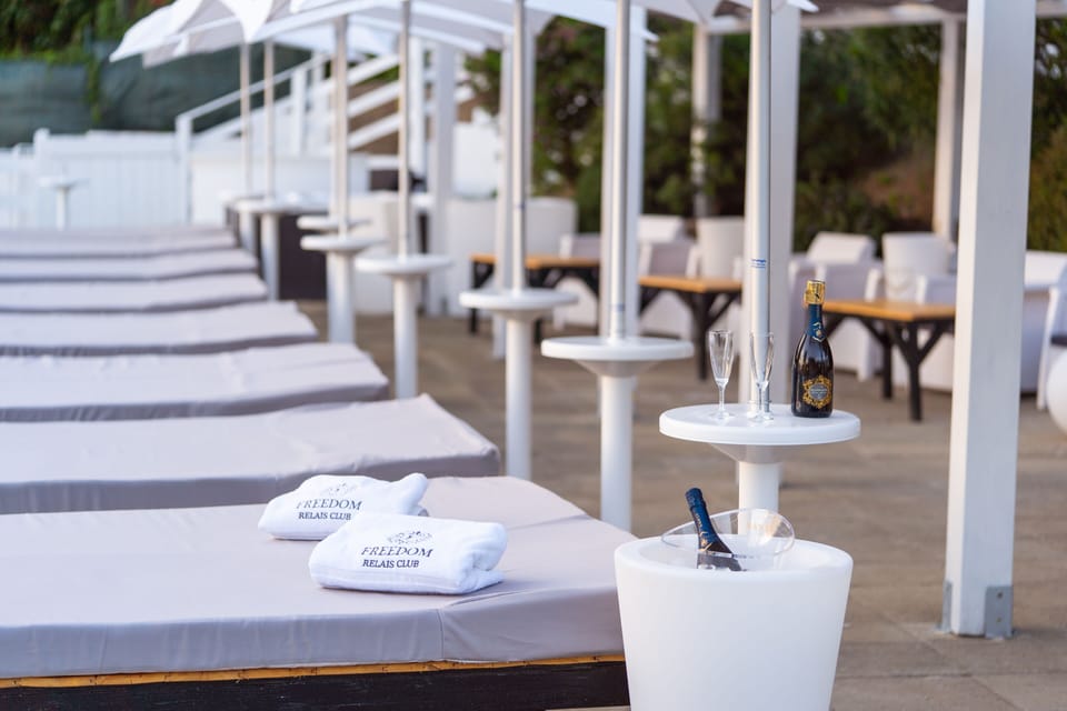 Outdoor pool, open 9:00 AM to 7:00 PM, pool umbrellas, sun loungers