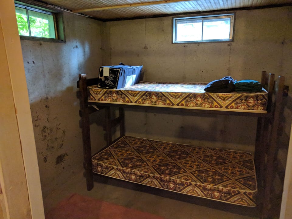 Bunk beds in basement.