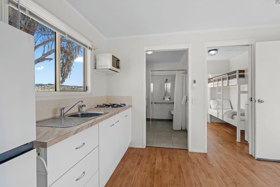 Standard Unit - Pet Friendly | Private kitchen | Full-size fridge, microwave, stovetop, electric kettle