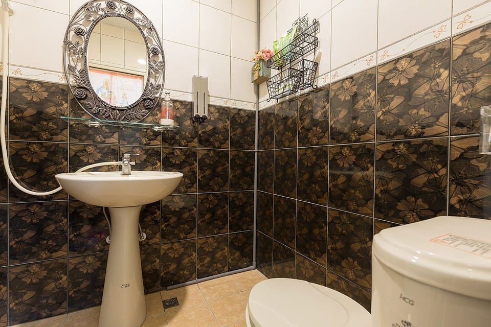 Shower, free toiletries, hair dryer, slippers