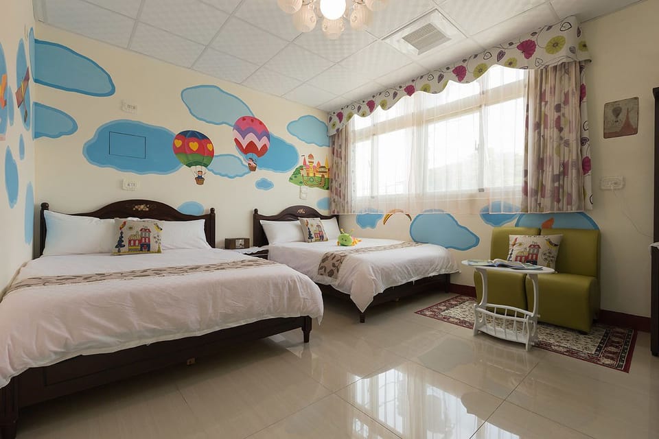 Standard Quadruple Room | Desk, blackout drapes, soundproofing, free WiFi