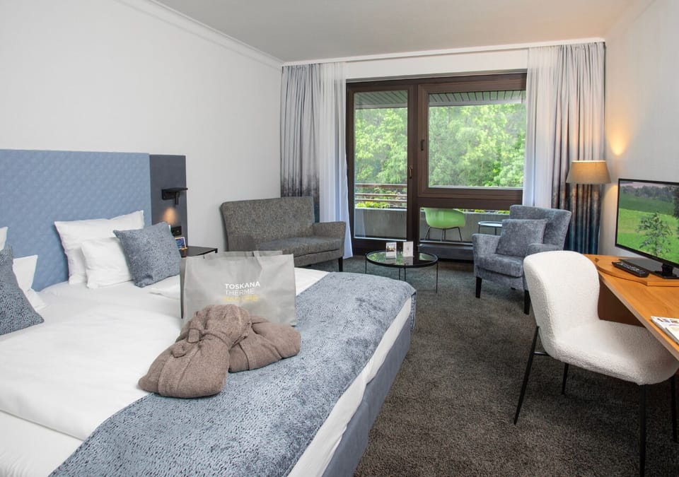 In-room safe, desk, cribs (free), WiFi (free)