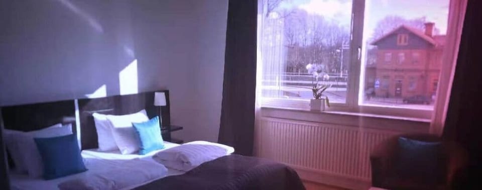 Double Room | Desk, blackout drapes, WiFi (free), bed sheets