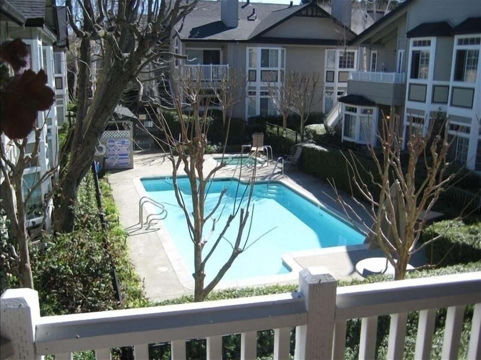 View of the pool from the living room balcony