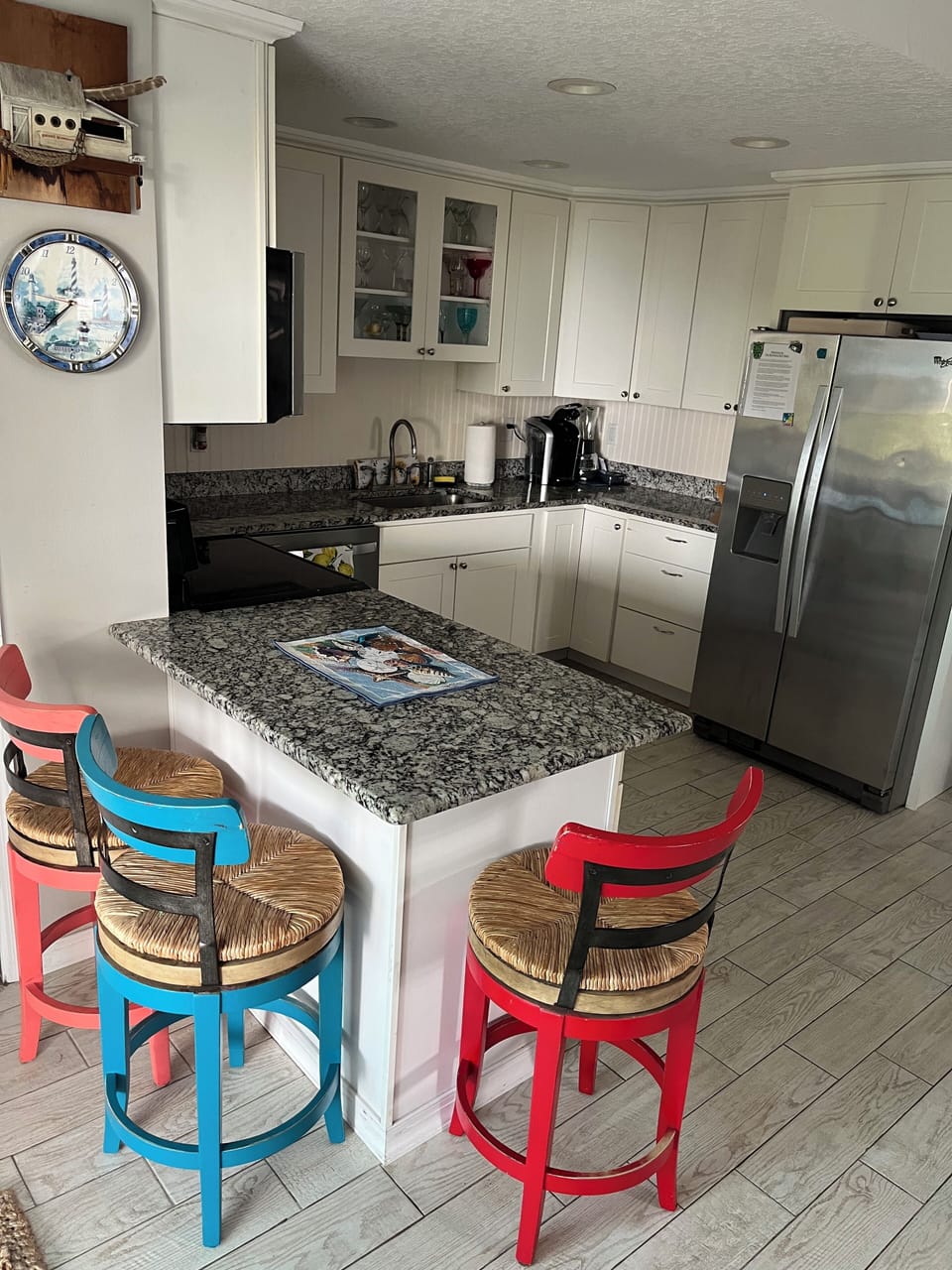 Plenty of seats for Entertainment. Downstairs has door to back deck. 