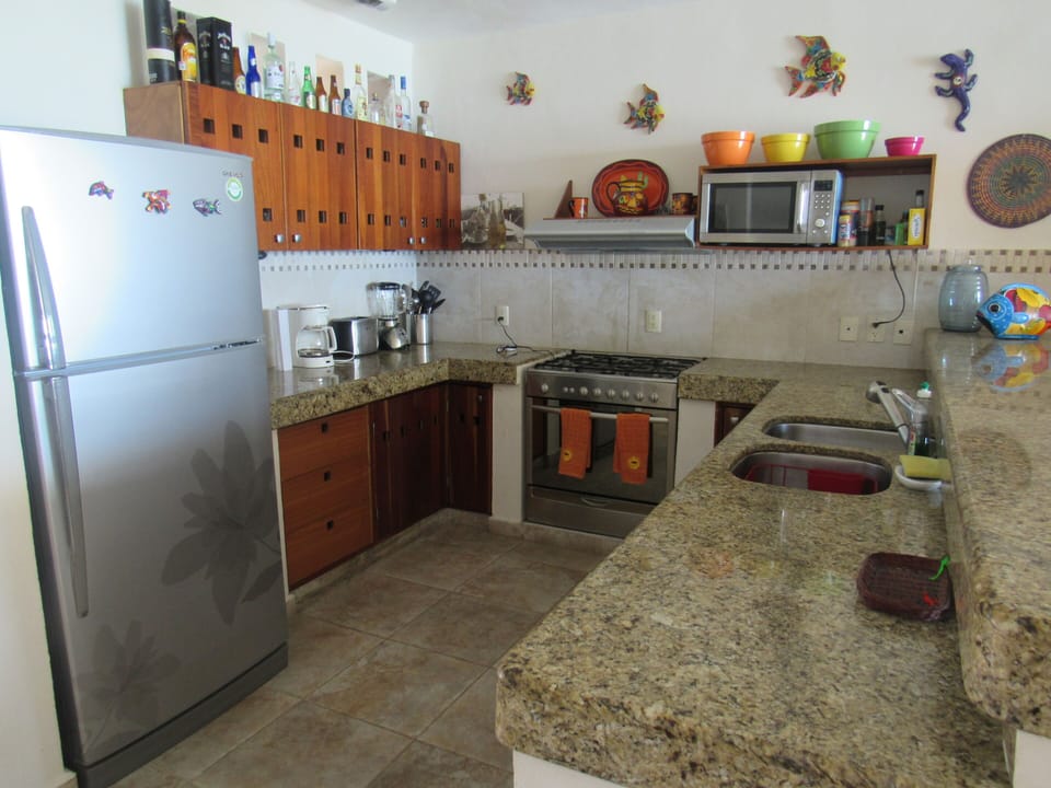 Large kitchen with stainless steel appliances