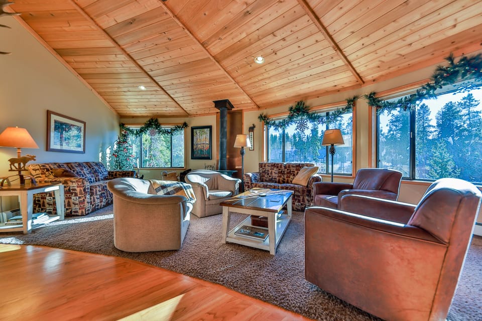 Warm cedar ceiling adds to the ambiance. Along with sunny meadow and tree views.