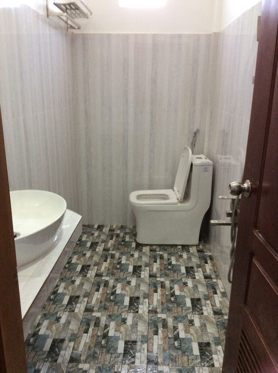 Shower, rainfall showerhead, designer toiletries, hair dryer