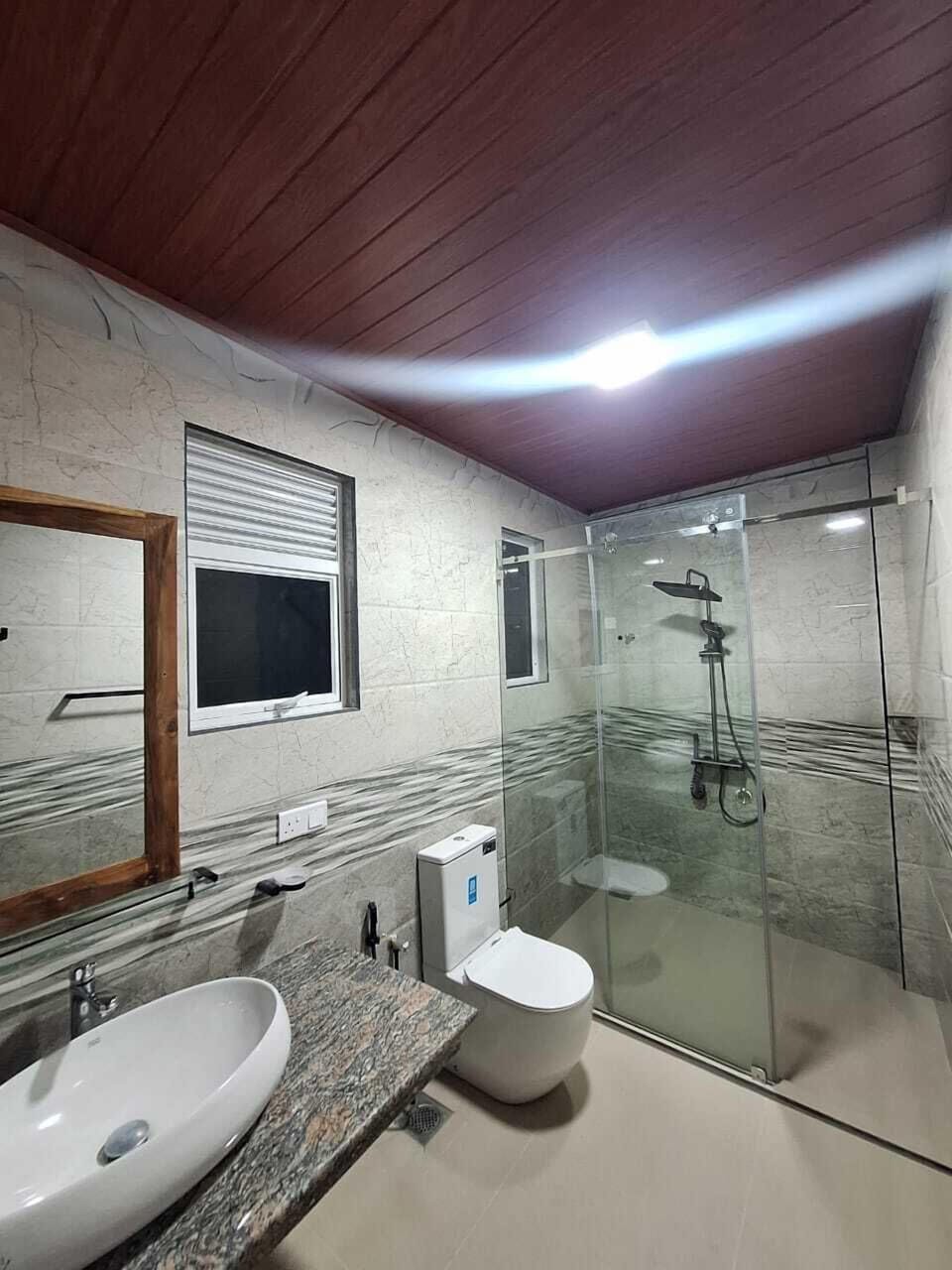 Family Quadruple Room, 1 Bedroom, Mountain View | Bathroom | Shower, rainfall showerhead, slippers, towels