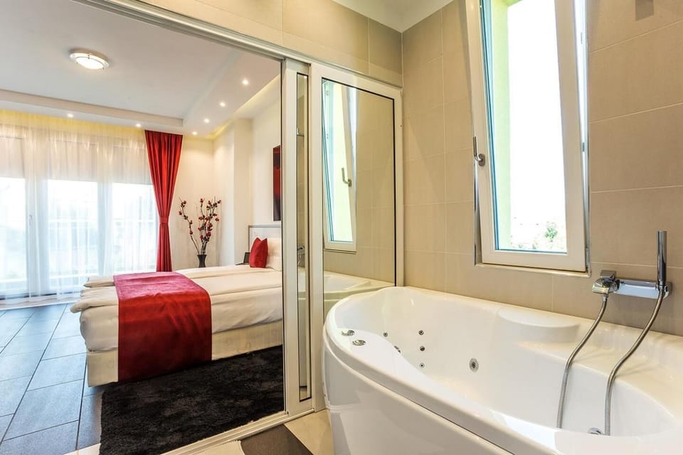 Bathtub, free toiletries, hair dryer, bathrobes