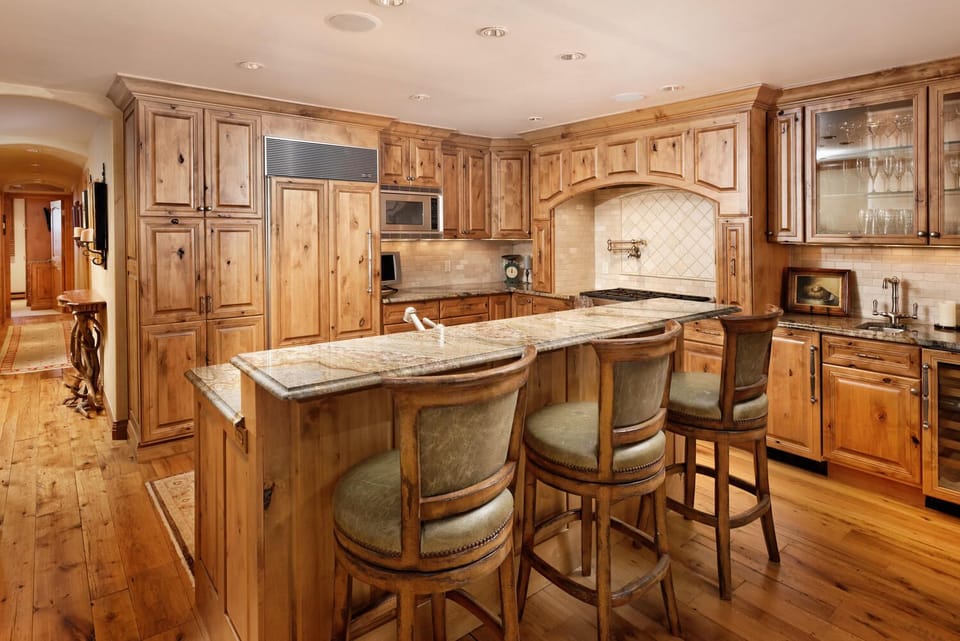 Fully stocked Gourmet Kitchen, with Bar Area.