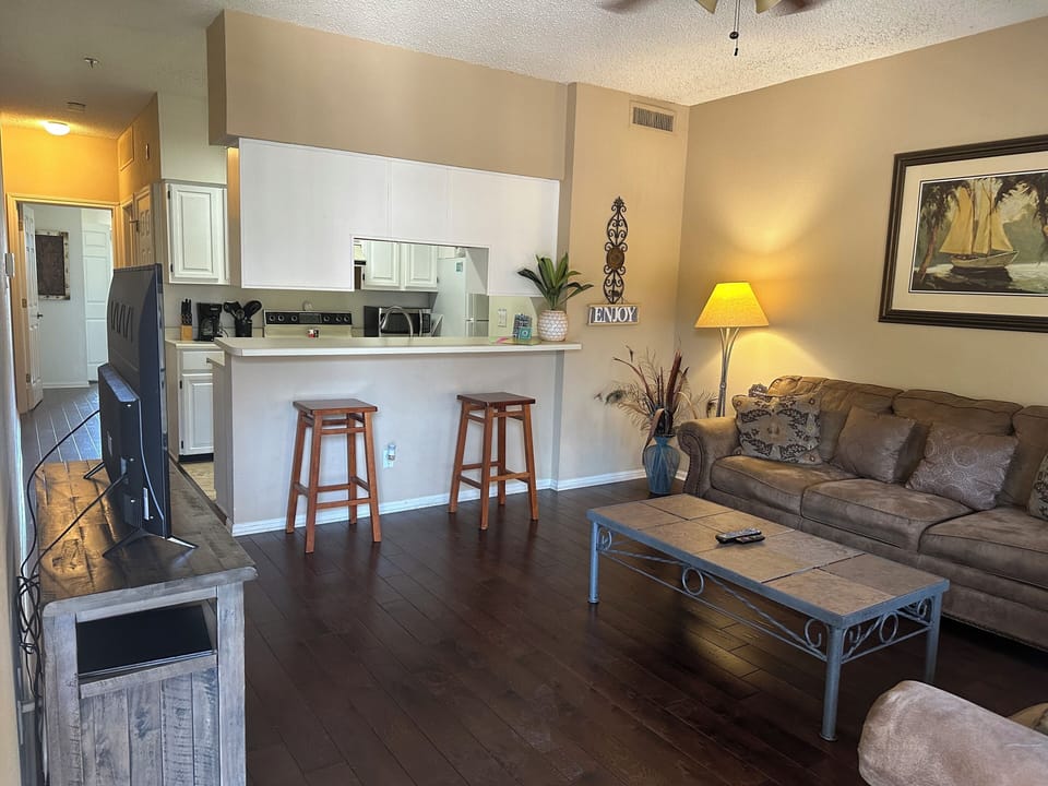 Living room with full size sofa and loveseat