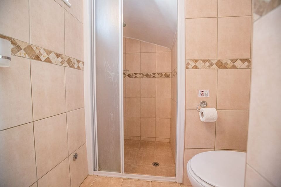 En Suite Bathroom with shower and WC