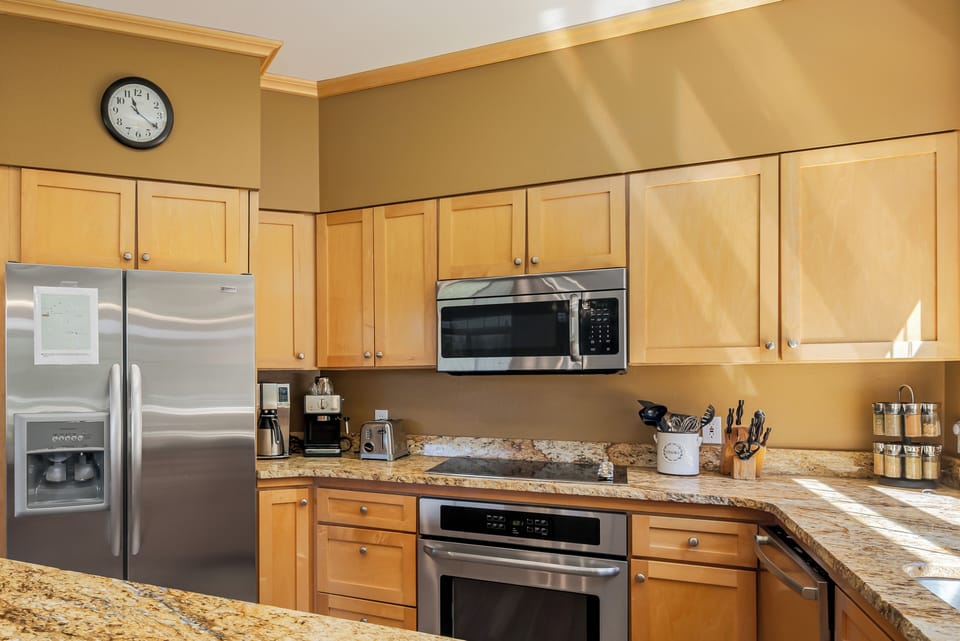 Kitchen with coffee makers and lots of spices!