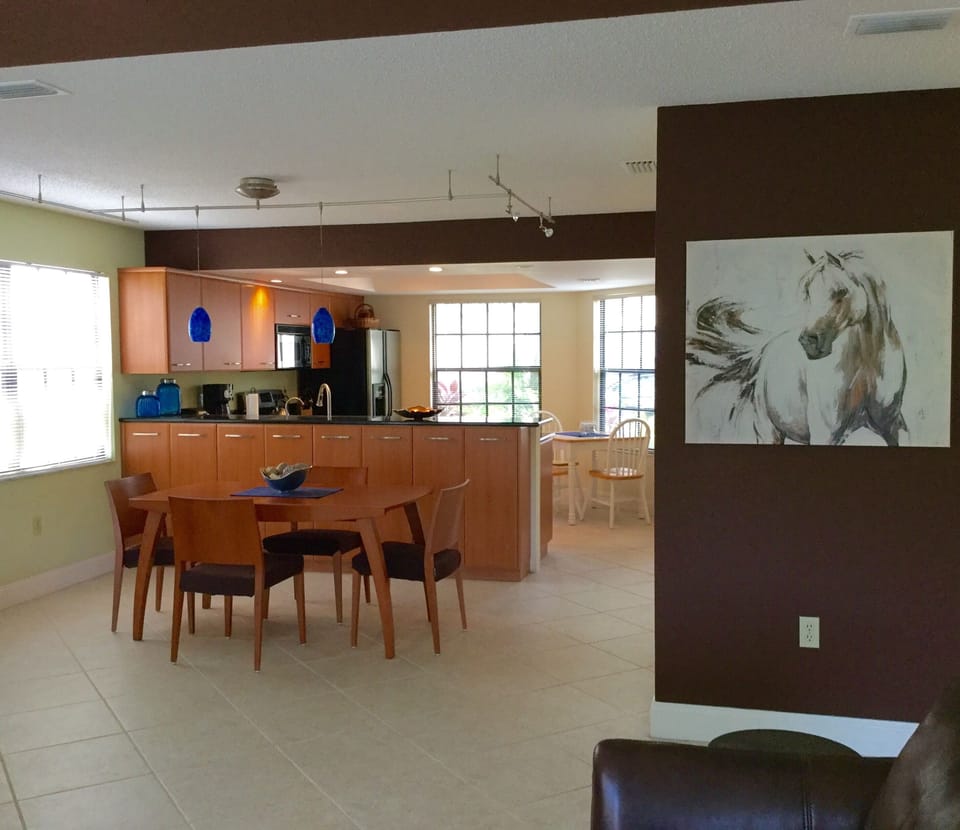 kitchen, dining open floor plan with view of lake lots of light 