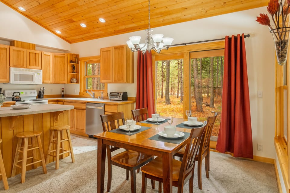 Dining table has additional bench that can seat a total of 6