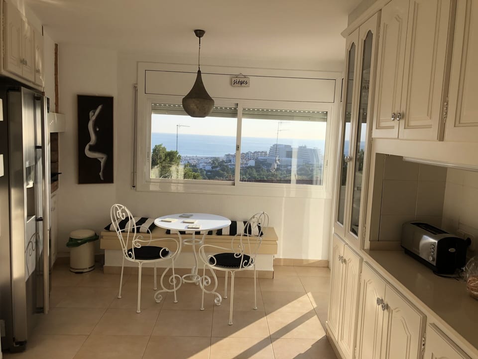 Kitchen with views and access to ground floor terrace