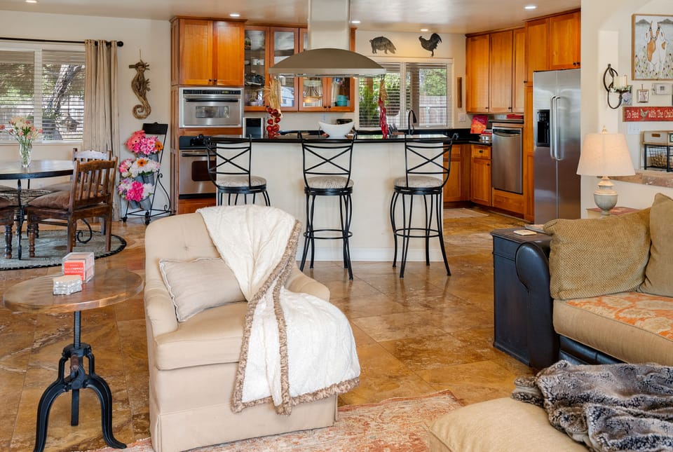 Open concept kitchen is open to large living room to enjoy family gatherings