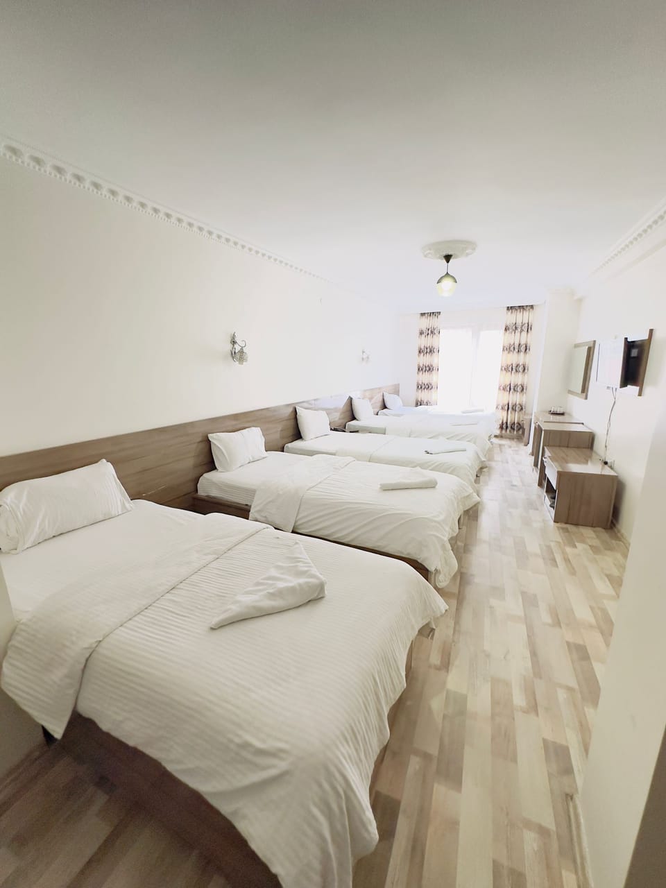 Family Room, Non Smoking | Minibar, laptop workspace, blackout drapes, soundproofing