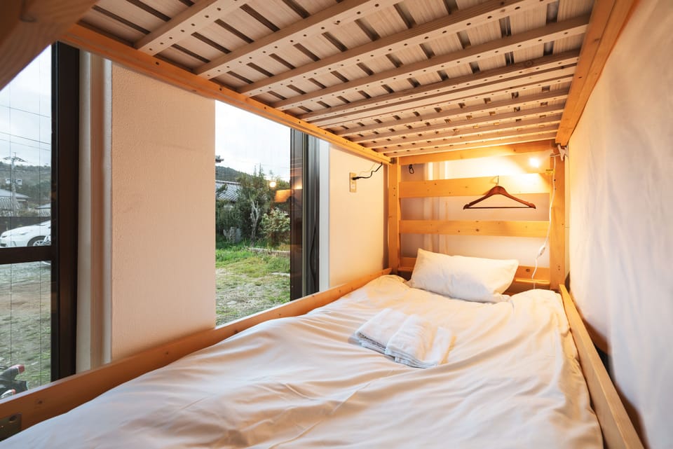 Mixed Shared Dormitory | Laptop workspace, blackout drapes, WiFi (free), bed sheets