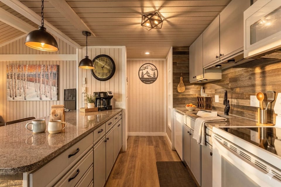 Galley kitchen - completely stocked for cooking with friends